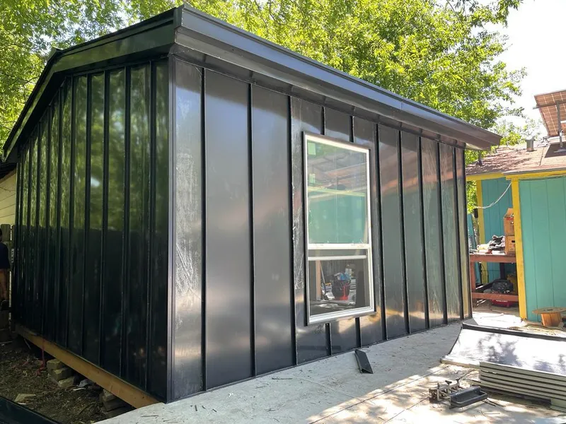 Black standing seam metal wall panels for Roof Inspection in Bay City