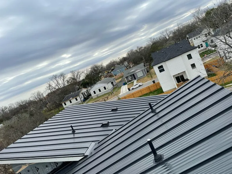 Standing seam metal roof panels with vents for Skylight Repair in Bay City